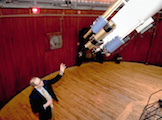 The 23-foot-long tube supports two smaller telescopes in addition to the original 18.5-inch lens. One is heavily filtered to enable viewing of the sun. The other features a wide-view lens that allows observers to orient themselves by locating a large "landmark," such as the moon, in the vast night sky.